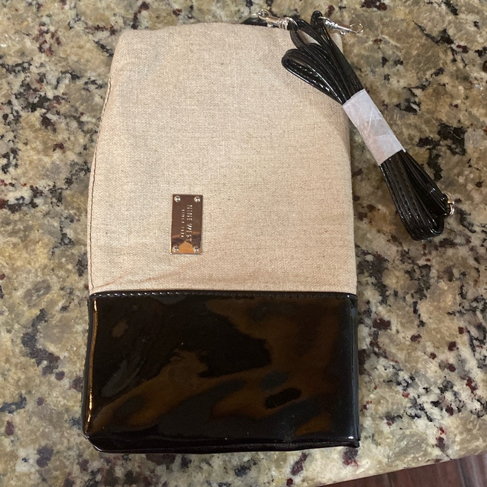 Tan canvas with black patent leather accent clutch purse